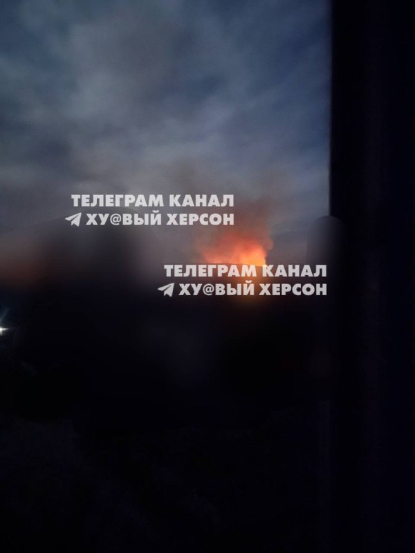 Fire and smoke rising after suspected airstrike in Kherson