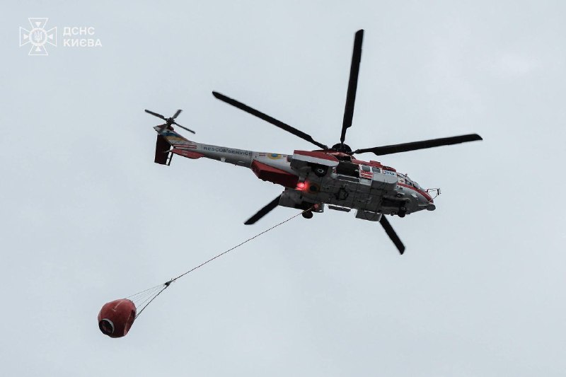 Firefighters using helicopters to extinguish fires in Kyiv